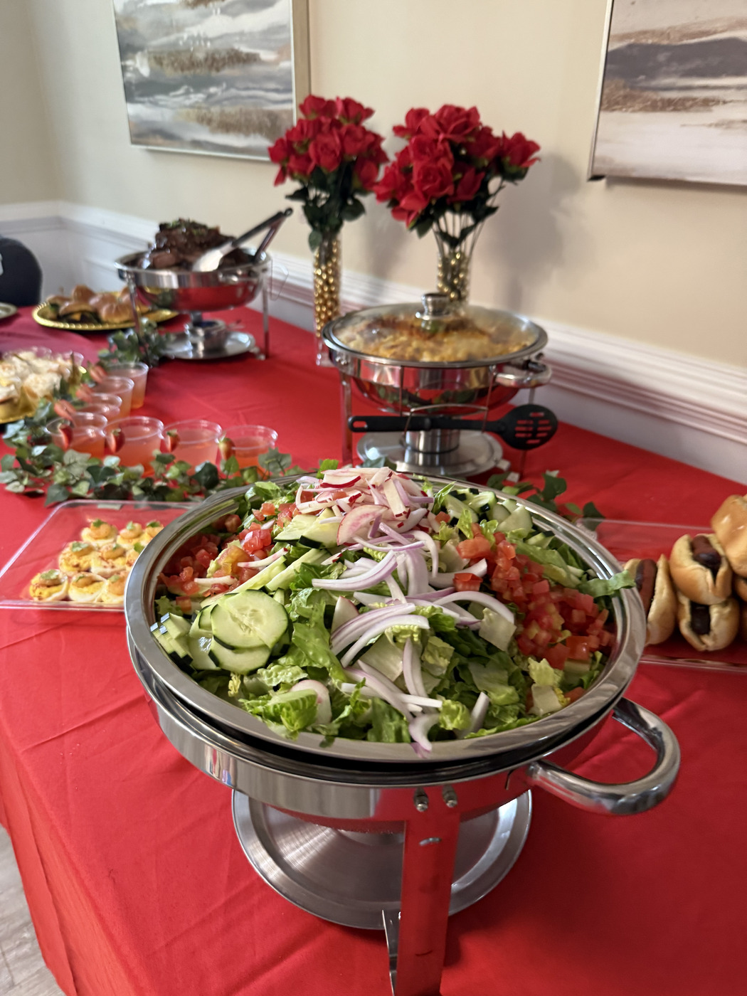 Outdoor catered event buffet with Southern-inspired dishes