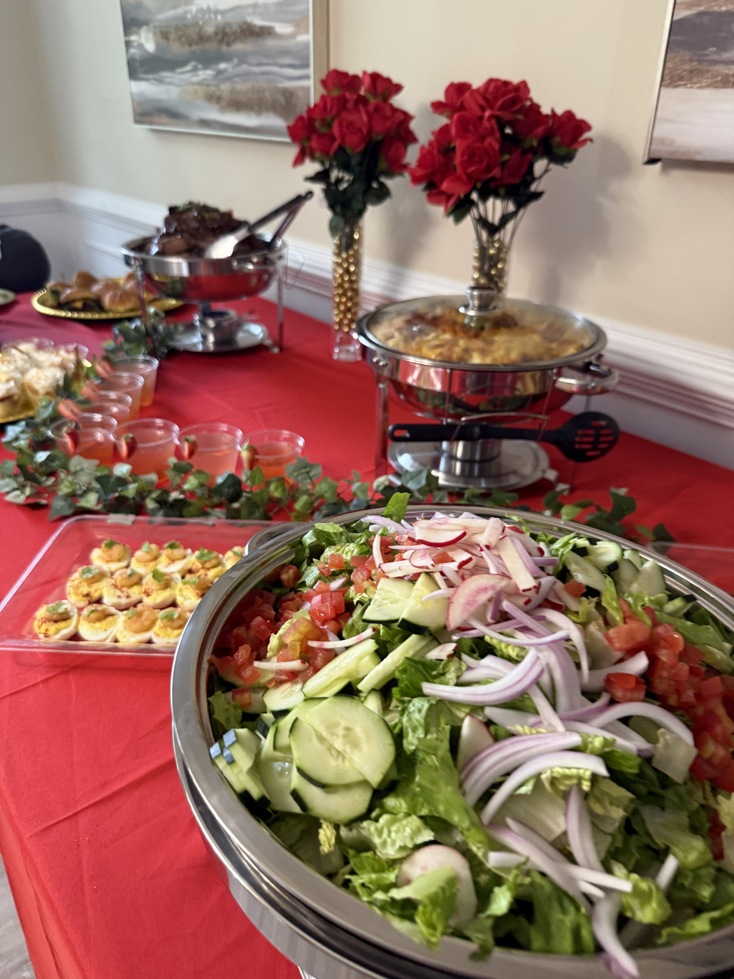 Intimate gathering with guests enjoying chef-prepared courses